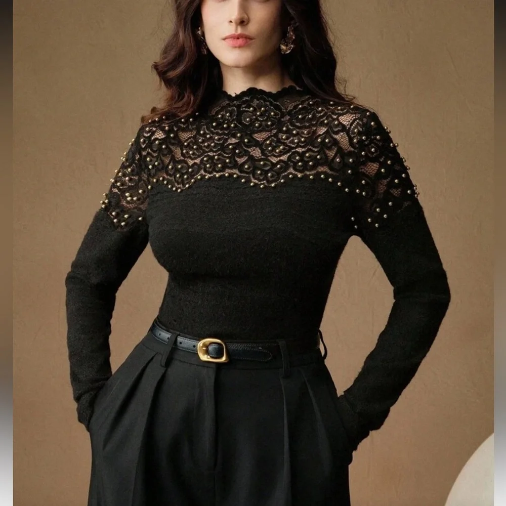Elegant Black Lace Top with Gold Accents